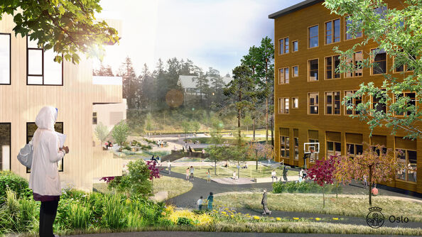 En dame stor og ser mot en skole og et sykehjem