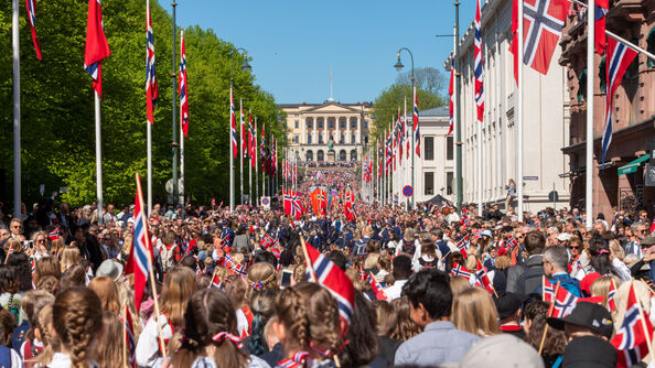 The 17th of May parade on Karl Johans Gate toward the Royal Palace.
