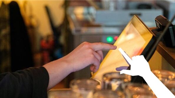 illustrasjonsbilde: hånd som peker på en ipad