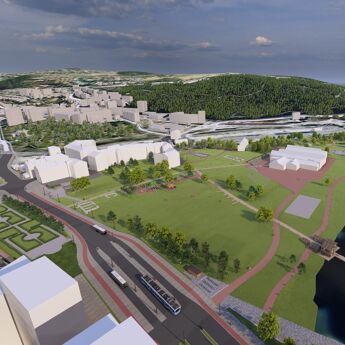 Grønn park og bygninger rundt.